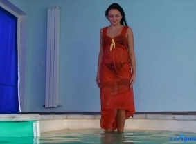 Simonne is wearing a seethru nightgown underwater.