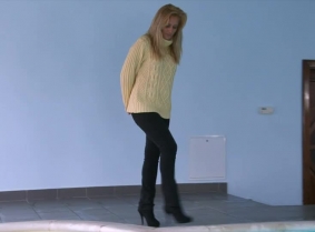 Monika is back for a new pool play, wearing another casual combination from her closet. Tight jeans and high heeled boots combined with a wool sweater.
During the clip she took of the boots showing her white socks to the camera.