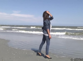 Claudia C is back on the beach and this time she has something for the fans who prefer wet denim clothes.

